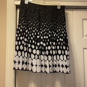 Black skirt white dots